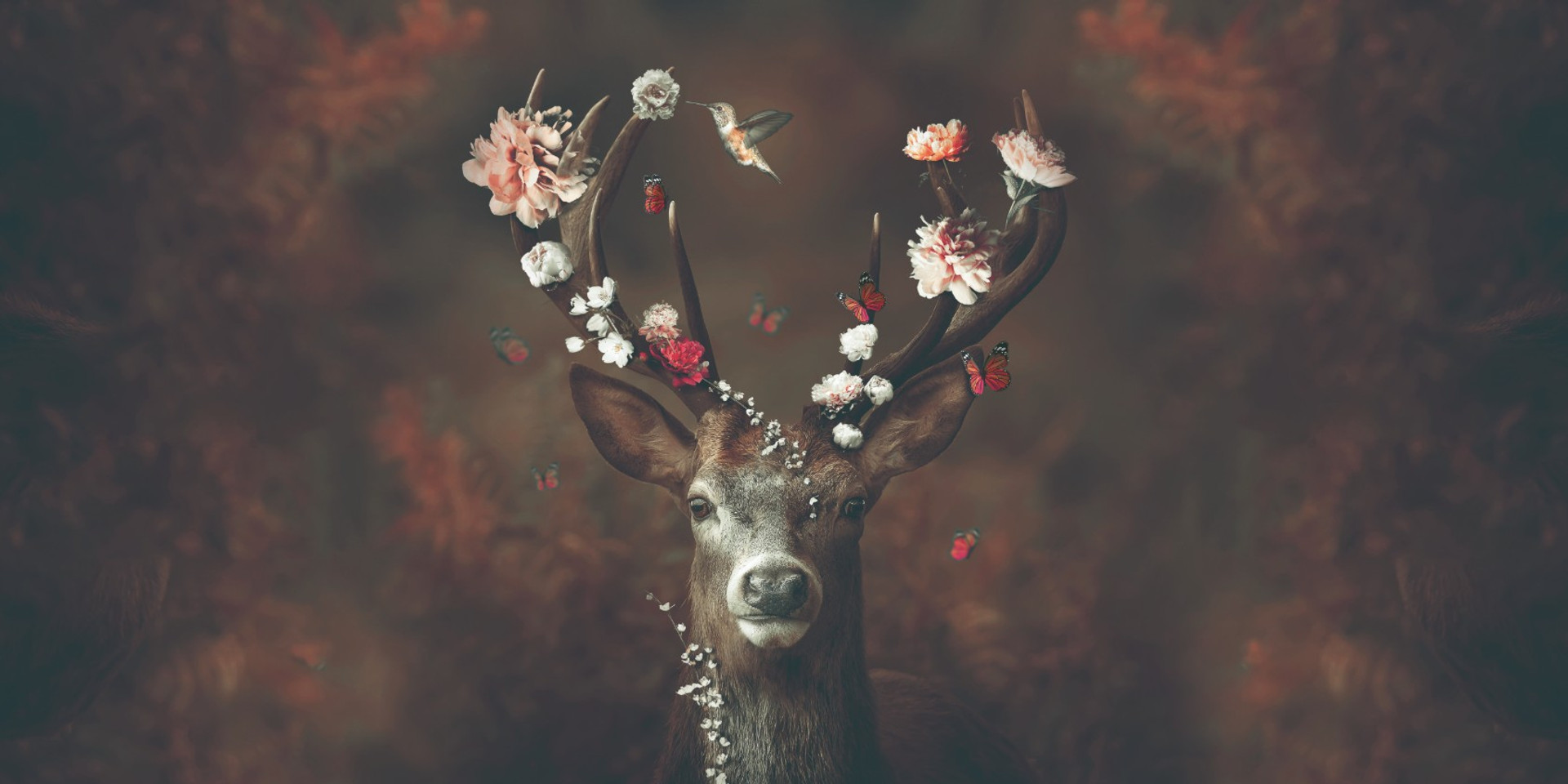 Design depicting a stag with flowers in its antlers.