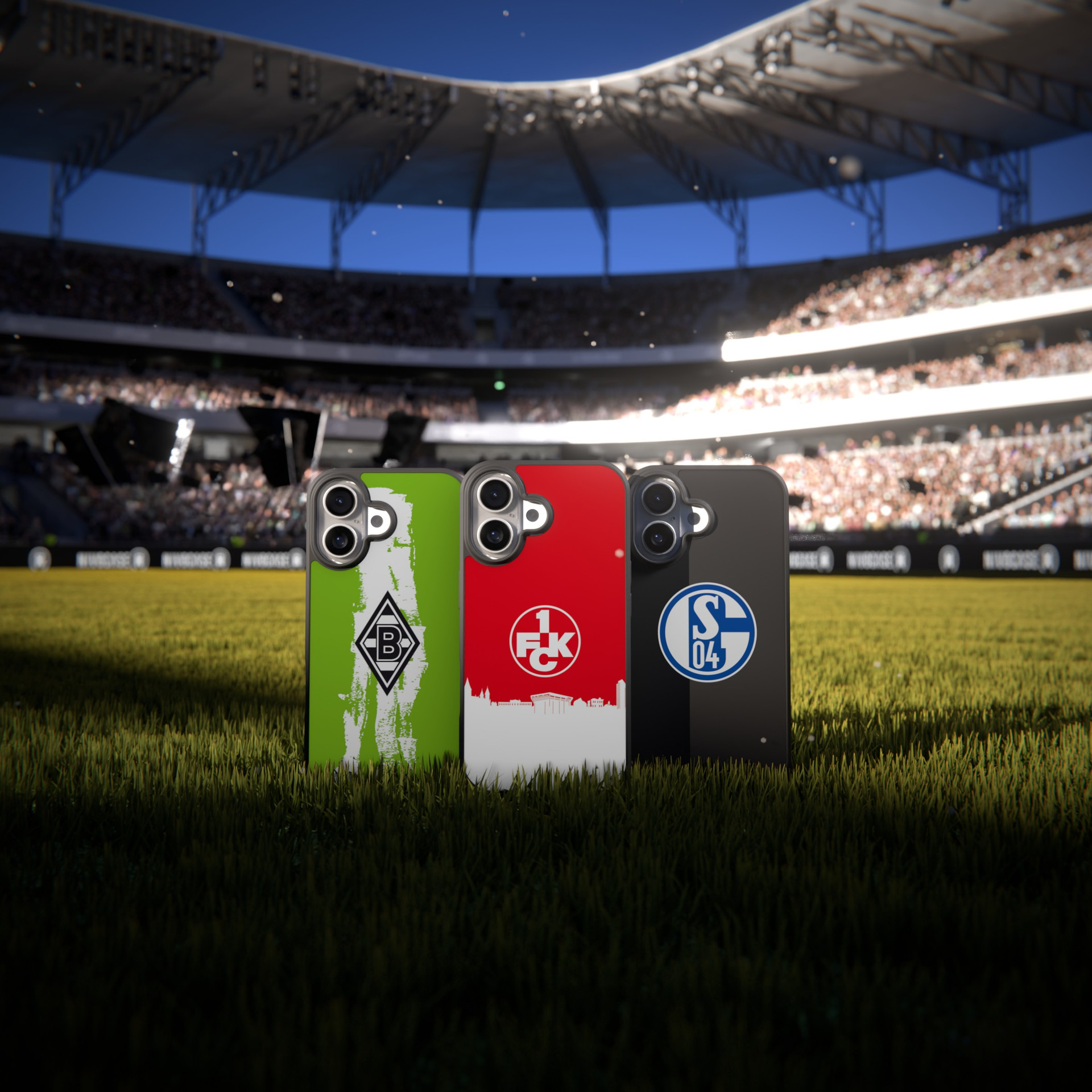Three NIVOCASE football club phone cases standing on the grass in a stadium, showing green, red and black designs with team logos.